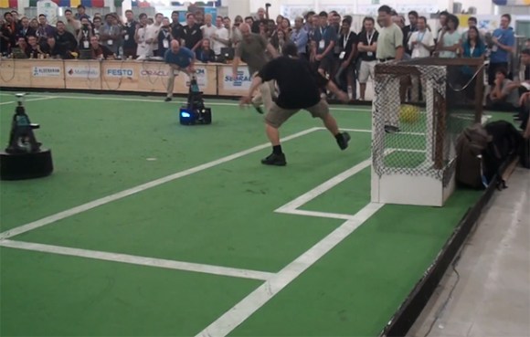 Soccer robot scores on humans