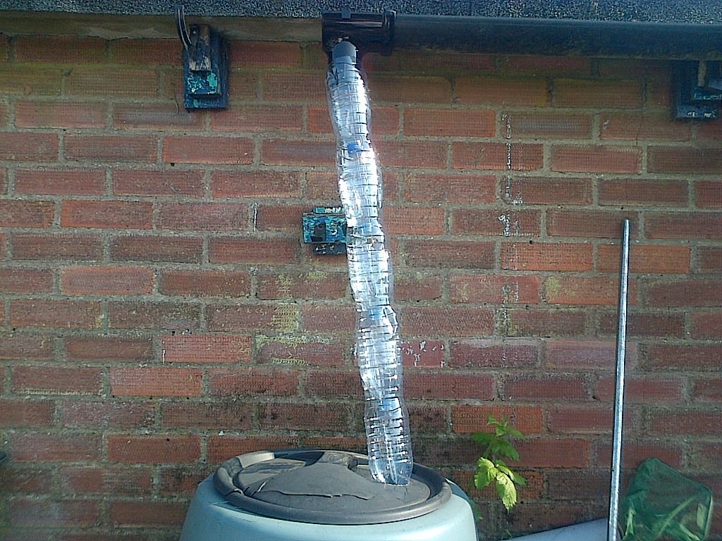 Plastic Bottles Funnel Rain Into Rain Barrels Hackaday