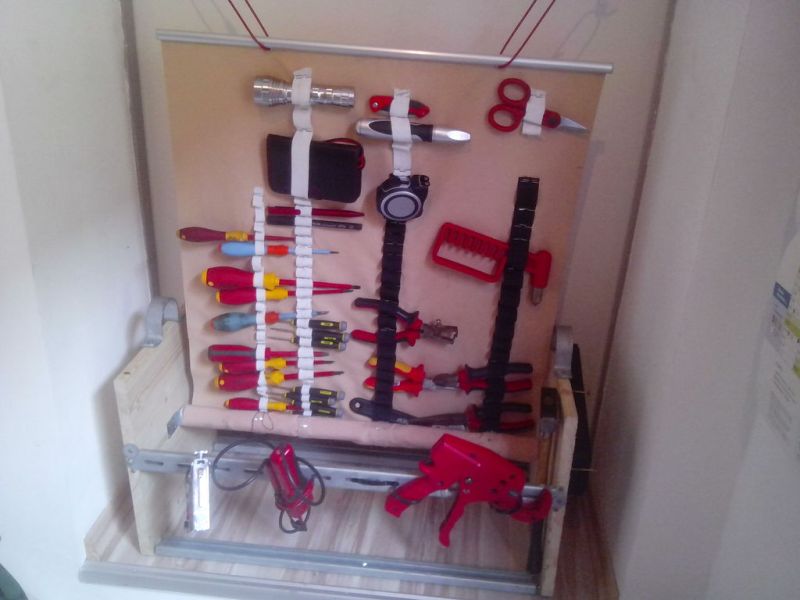 Auto Roll-up Tool Storage | Hackaday