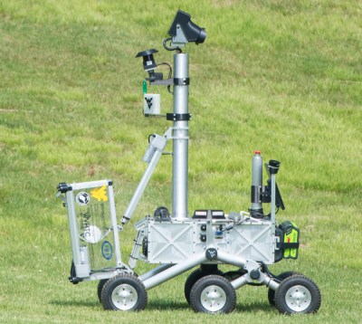 The Mountaineers team robot is seen after picking up the pre-cached sample during its attempt at the level two challenge during the 2015 Sample Return Robot Challenge, Thursday, June 11, 2015 at the Worcester Polytechnic Institute (WPI) in Worcester, Mass. Sixteen teams are competing for a $1.5 million NASA prize purse. Teams will be required to demonstrate autonomous robots that can locate and collect samples from a wide and varied terrain, operating without human control. The objective of this NASA-WPI Centennial Challenge is to encourage innovations in autonomous navigation and robotics technologies. Innovations stemming from the challenge may improve NASA's capability to explore a variety of destinations in space, as well as enhance the nation's robotic technology for use in industries and applications on Earth. Photo Credit: (NASA/Joel Kowsky)