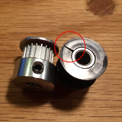 Circled in red is 3 hours of my life. On the left is my slightly more expensive solid aluminum pulley.