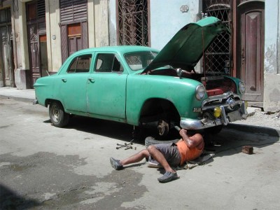 Roadside repairs are a fact of life. Image source: The Detroit Bureau