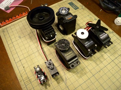 A selection of different sized servo motors. By Osamu Iwasaki