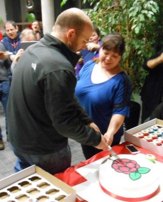 Eben and Liz Upton cutting the birthday cake