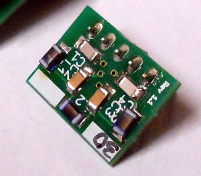 1206 chip discrete components hand-soldered to a PCB