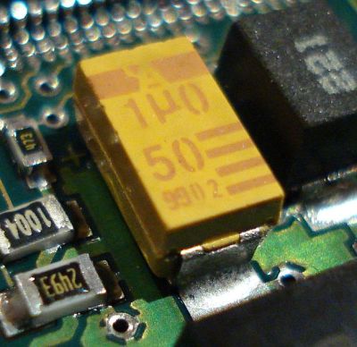 A surface-mount tantalum capacitor