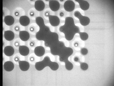 X-Ray of a PCB with a lot of bridges between solder balls.