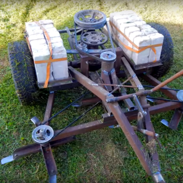 This Motorless Pull Behind Mower Is Made From Junk Hackaday