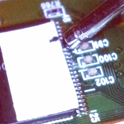 Two data pins on a TSSOP Flash shorted by a multimeter probe