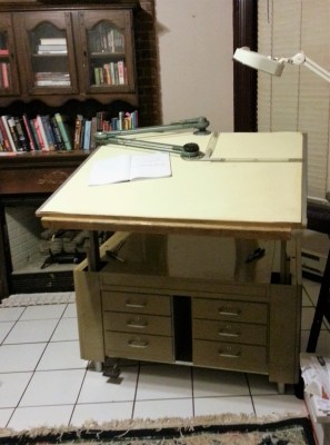 Nothing ties a room together in a small studio apartment like a 300lb drafting desk.