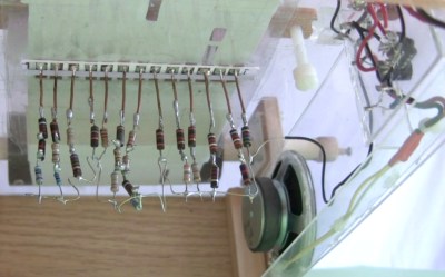 Carbon composition resistors in music player