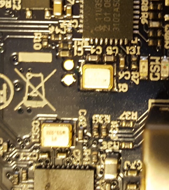 This PCB has two microcontrollers, and both have clocks as close as possible to the controller to minimize trace length.