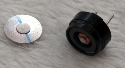 A "piezo" buzzer that was assumed to have no significant magnetic field, but actually contains a magnet.