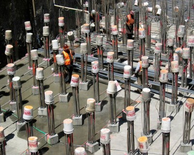 Millenium Tower pile system. 14" square piles can be seen surrounded by the concrete pile cap [Image Source: CRSI]
