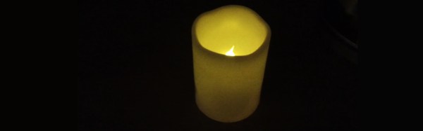 Candle with flicker led that you blow out