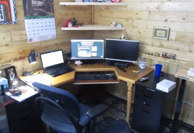 Office side of my little "hack shack," a prefabricated 10'x12' shed. All the interior woodwork is mine except for the IKEA cabinets. I like wood.