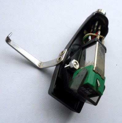 An Ortofon moving-magnet cartridge in its removable headshell.