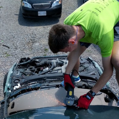 jag-on-roof-guy-cutting