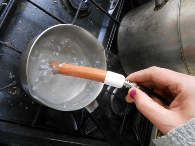 The probe immersed in boiling water for a few minutes to gain an accurate reading.