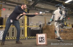 Atlas - Boston Dynamics robot being pushed