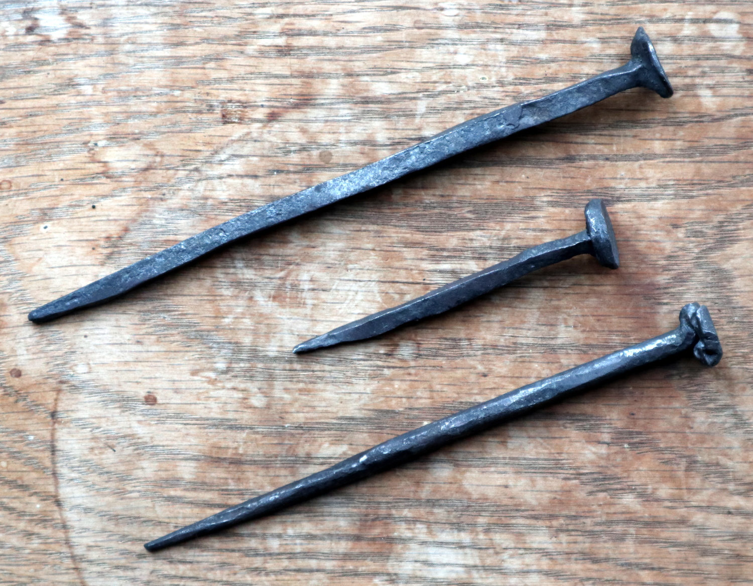 mediaeval nail three nails on wood