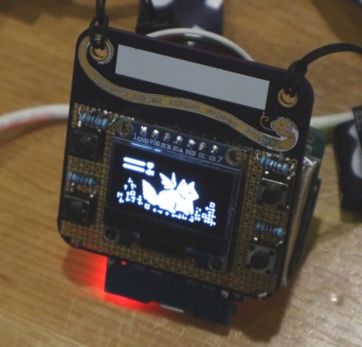 A fully functional event badge built upon an event badge. Fuchsia's Tamafoxi runs the badge.team firmware.