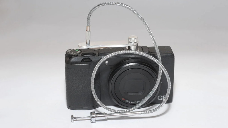 One-of-a-kind SNAPSHOT Camera Strap shutter by 