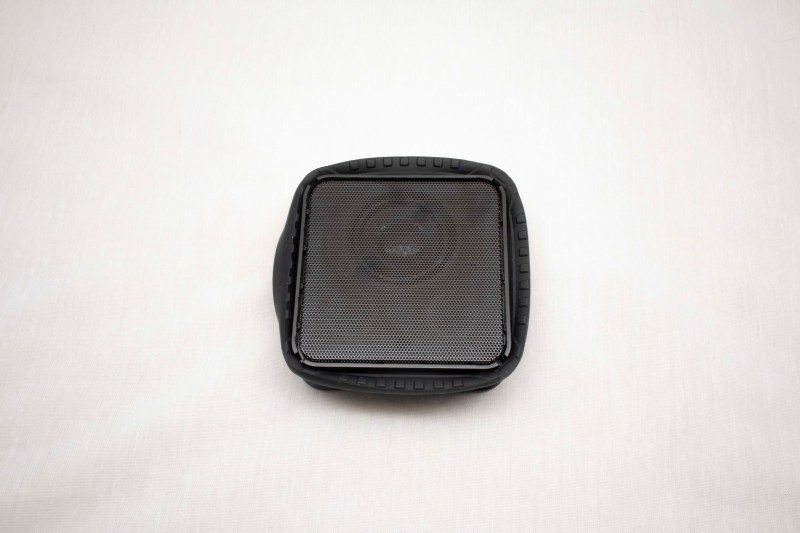 Peel back rubber surround.