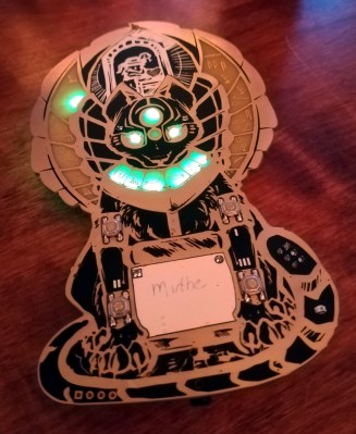 [Myrtle]'s winning badge, with all the LEDs green.