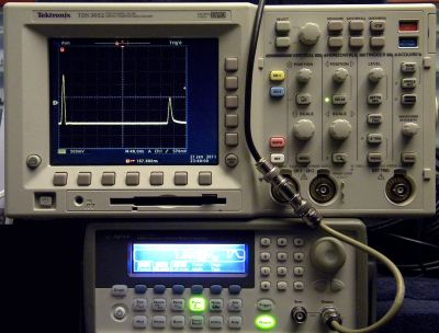 Time domain reflectometry demonstrated on the bench, with the original pulse on the left of the screen and its reflection on the right.