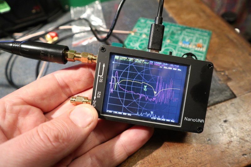 A NanoVNA characterising a whip antenna.