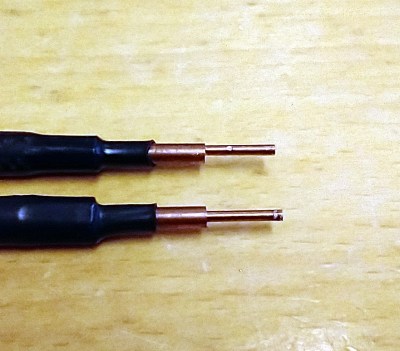 The tips of the electrodes, with a bit of discharge damage visible.