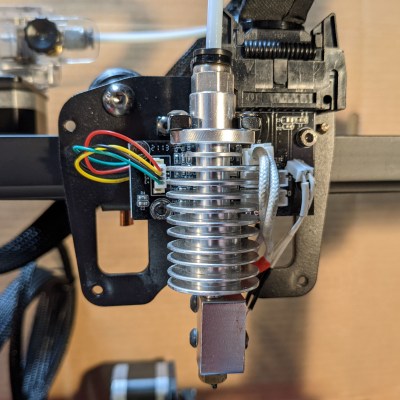 Anycubic Vyper extruder with cover removed, showing the hot end.