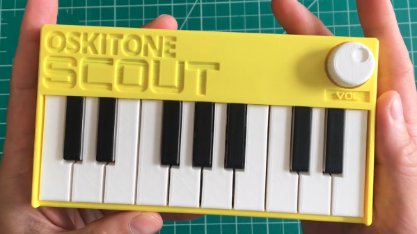 Small synth held in two hands