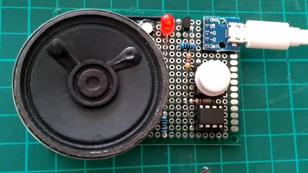 ATtiny85 on circuit board with 2n2222, pushbutton, usb-c power connector, LED, and speaker.