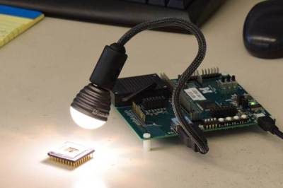 A test setup with a lamp shining onto a chip