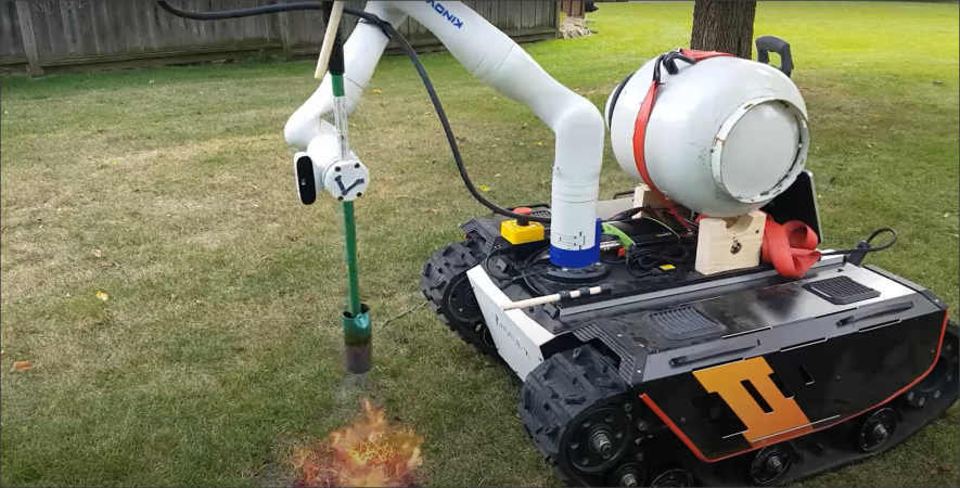 Flamethrower weedkiller mounted on a robot arm riding a tank tracked base
