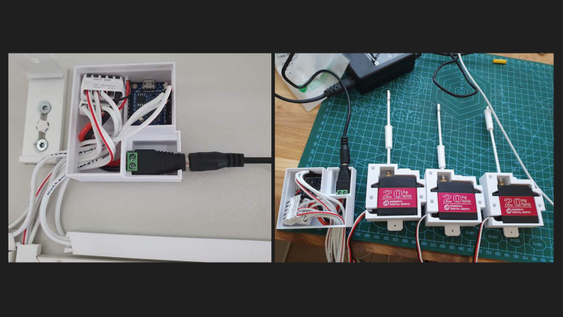 Picture of the automatic blind controller and three servo motors, all in their enclosures, displayed on a table.