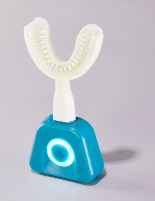 A whole-mouth toothbrush that brushes all of your teeth at once, in the span of 30 seconds.