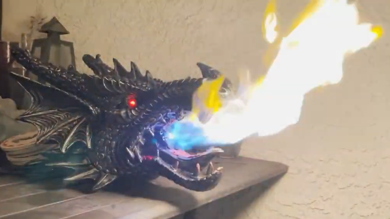 Fire-breathing dragon head, side view