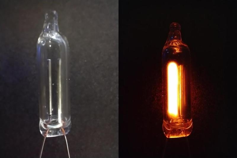 NE-2 neon lamp illuminated side-by-side with non-illuminated