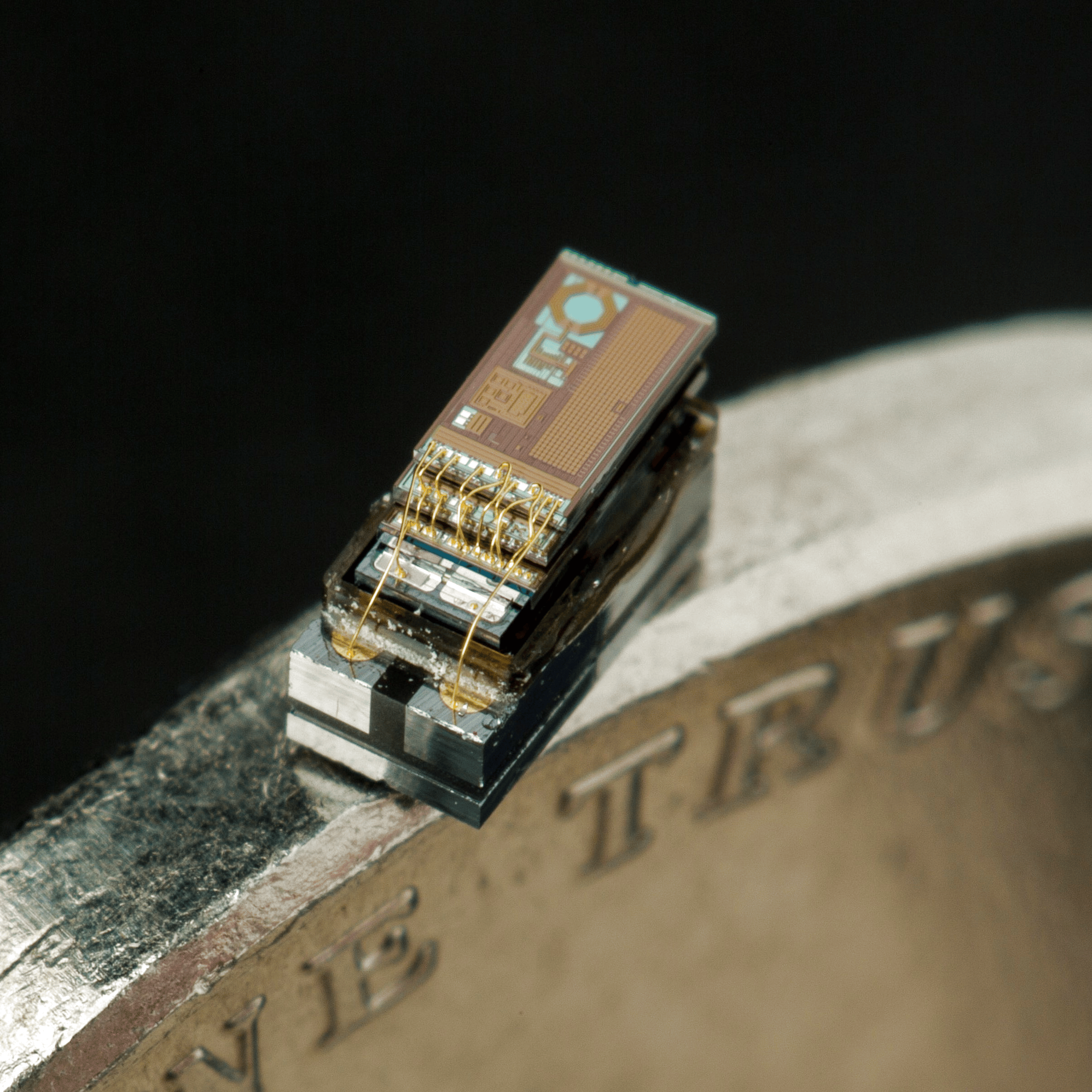 Mote-on-coin-detail-thumb_bright | Hackaday