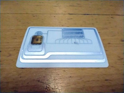 Here's what's going on inside your bank card. The variable capacitor is shown at top centre, and the chip is sittling in its pick-up coil on the left.