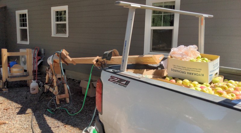 showing the ramp and sprayer of the cider press