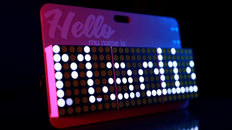 A scrolling name badge that uses LED matrices.