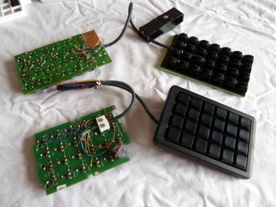 A pair of num pads wired up to a Teensy becomes a keyboard.