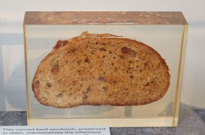 A corned beef on rye encased in resin.