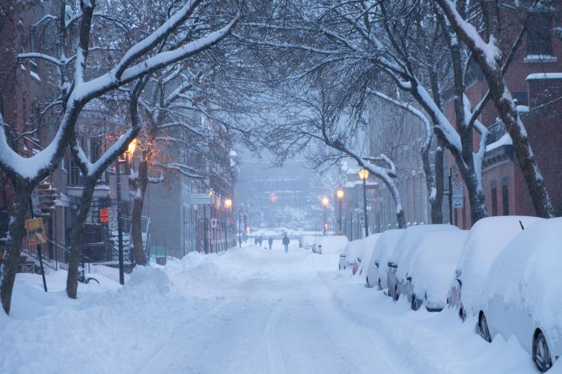 An snowy city street.