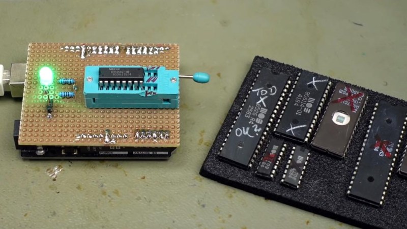 A circuit board with a memory chip in a socket, and many memory chips in foam