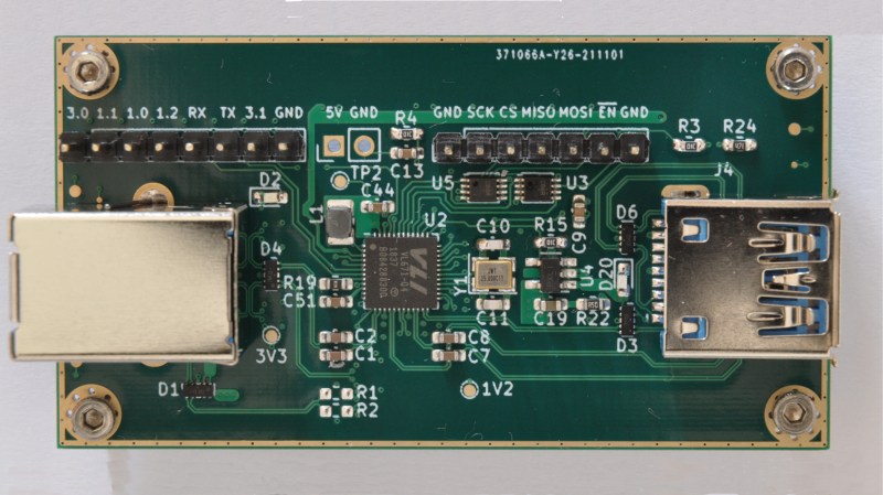 Top side of the VL670 breakout board, with two USB connectors and the VL670 chip in the center.